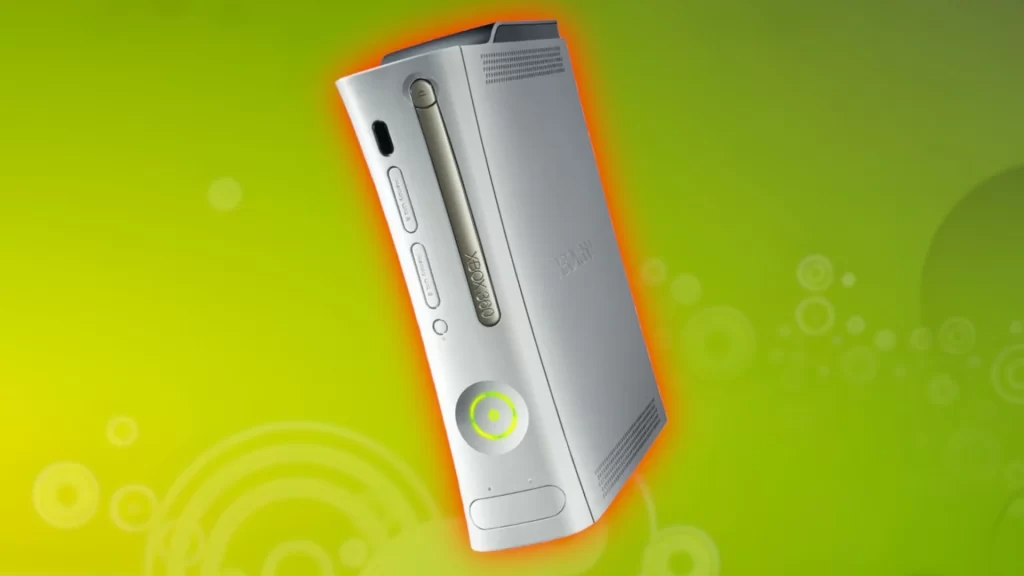 Close-up of a silver Xbox 360 console against a green background with abstract circular patterns. The console is positioned vertically.